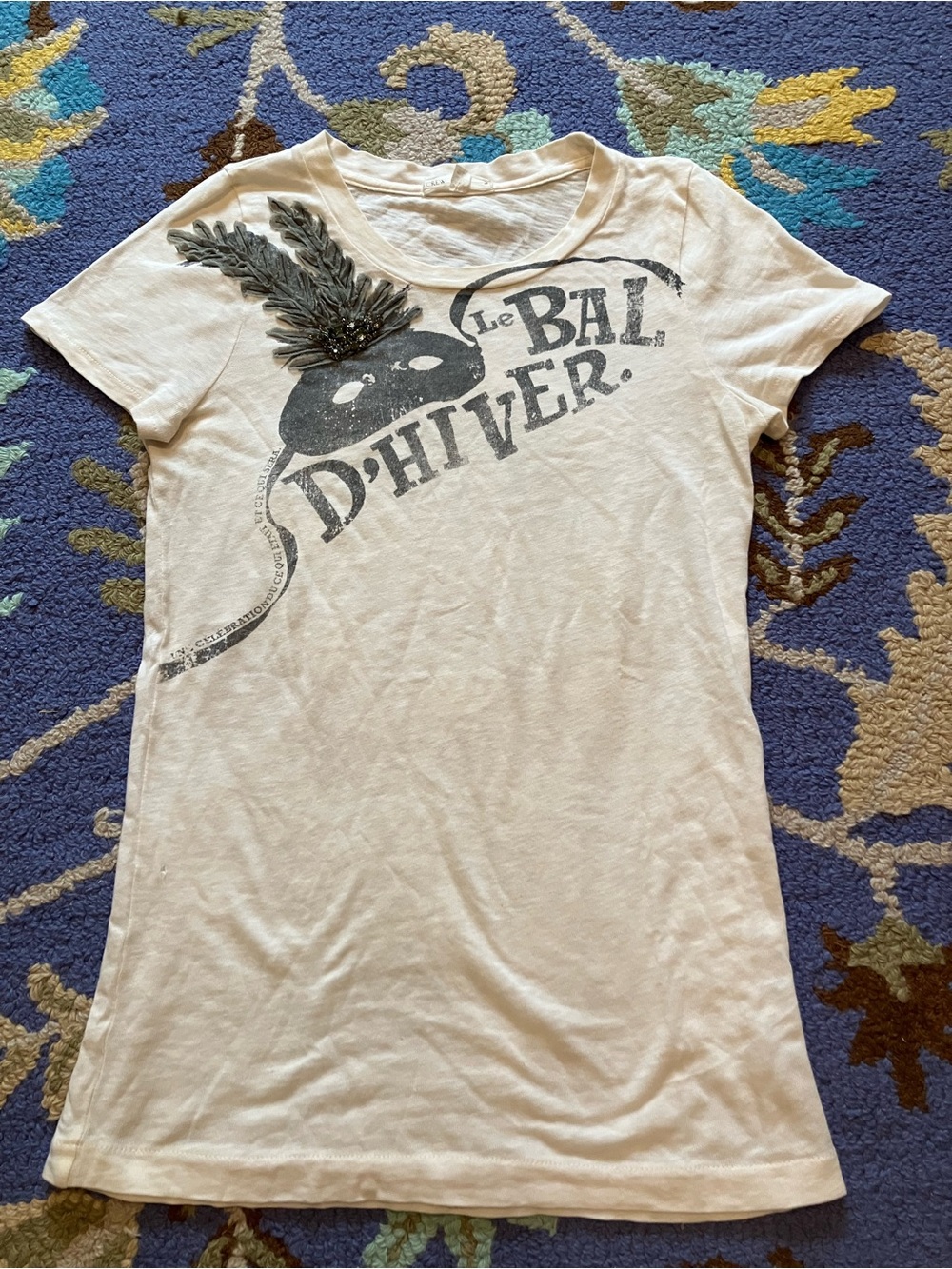 J. Crew Cream Graphic Tee with Black Mask and Beaded Feather Accent